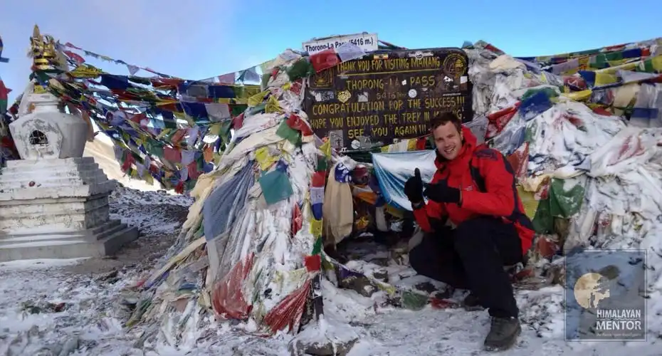Posing for a photo as Thorong La top