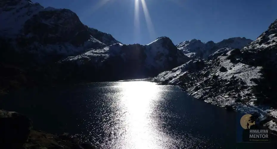 Morning sun rays hits in the Lake Gosaikunda  
