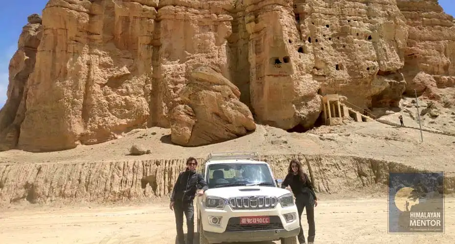 Our clients are posing for a photograph with their 4WD jeep 