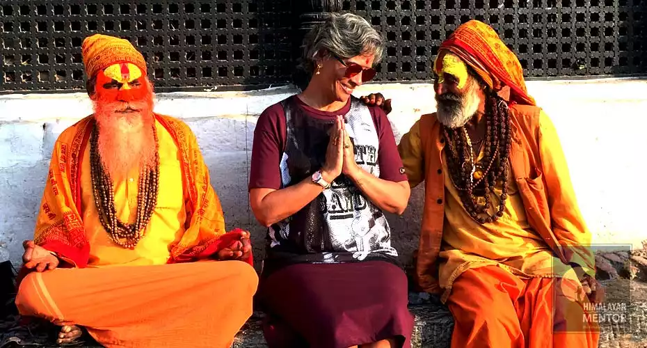 Client from Brazil enjoying to take a blessing from Sadhus in Pashupatinath temple.