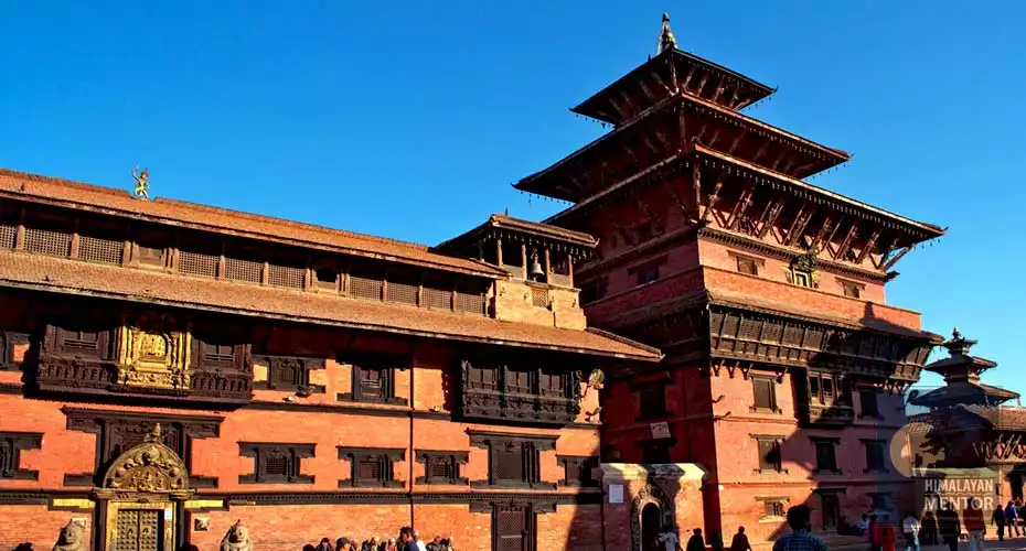 Golden gate and beautifully carved wooden windows at Bhaktapur Durbar Square.